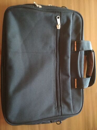 dell notebook adapter: Çanta satılır. Heç bir problemi yoxdur. 100 %. İçinə sənəd və sair