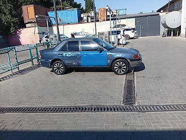 Mazda 323: 1990 г., 1.8 л, Механика, Бензин, Седан