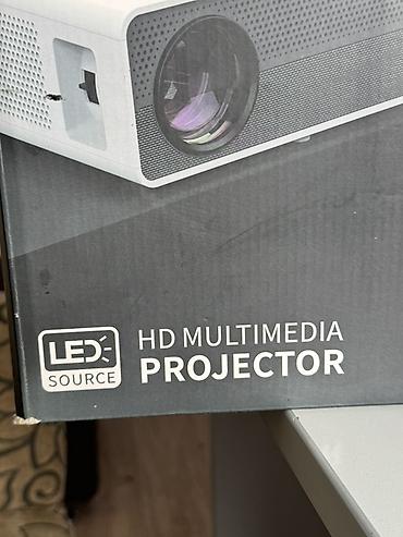 Проекторы: Проектор для домашнего кинотеатра - Компактный LED‑проектор «Home — 9