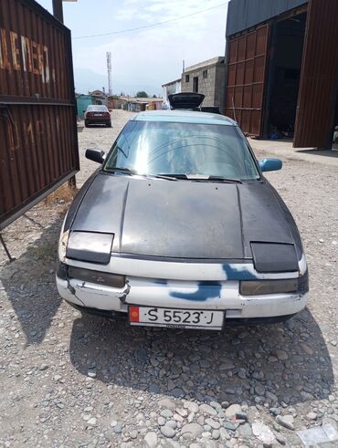 гольф 3 багажник: Автомобиль Mazda 323F (BA) бирюзового цвета, представленный в кузове
