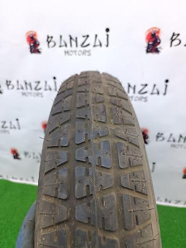 2 gr: Колесо докатка на штампованном диске Параметры: - Размер: R15 - Шина — 3