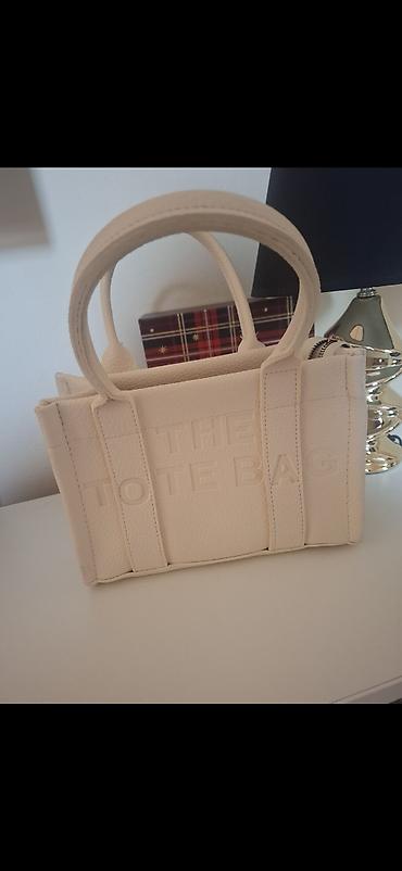 ray ban beograd usce: Bež tote torba sa utisnutim natpisom “THE TOTE BAG”. Kompaktnih — 1