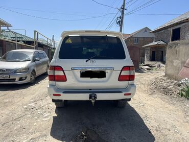 210 белый: Toyota Land Cruiser: 2005 г., 4.5 л, Автомат, Газ, Внедорожник