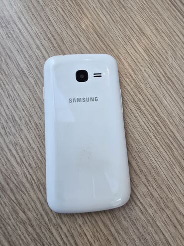 Samsung B5702 Duos, цвет - Белый, Отпечаток пальца