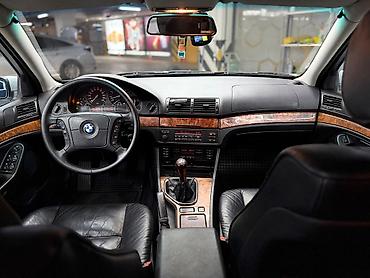 Другие детали салона: BMW — интерьер бизнес-класса с классическим оформлением и богатыми — 7