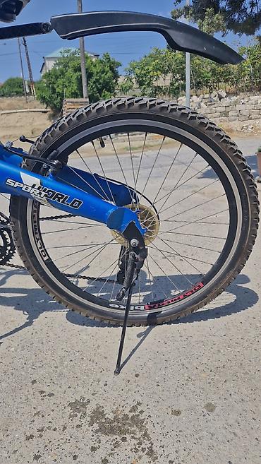 İdman velosipedləri: Olympia markalı dağ/şəhər tipli velosiped. Mavi-gümüş rəngli çərçivəyə — 5
