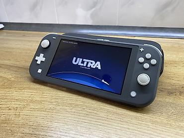 Nintendo Switch (Lite): Продаю Nintendo Switch Lite чипованая Карта памяти 256gb Состояние — 1