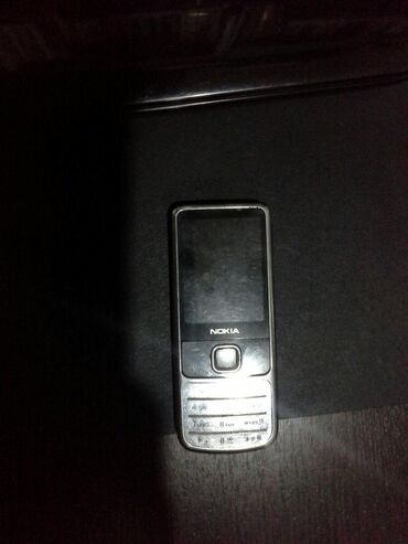 nokia 620: Nokia 6700 Slide, цвет - Серебристый, 1 SIM