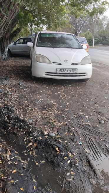 тико машине: Toyota Prius (седан, правый руль), белый цвет. Кузов: - 4-дверный