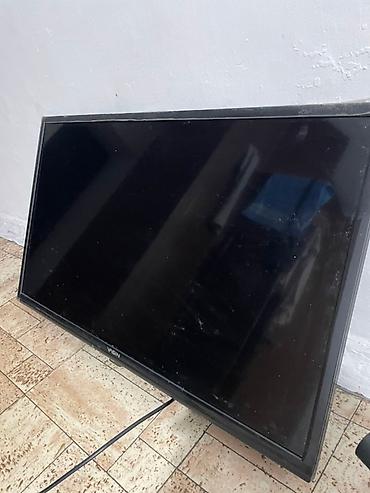 Телевизоры: Черный LED-телевизор Yasin с широким экраном. Телевизор оснащен — 4