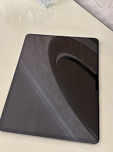 ipad case: Apple İpad air 13.Qutusu var, 94% pil, dəyişilməyib. Üstündə adapter — 1