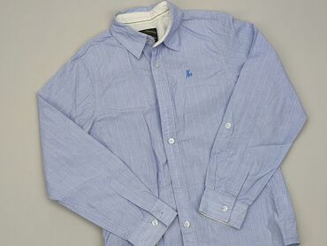 Koszule: Koszula 12 lat, stan - Bardzo dobry, wzór - Jednolity kolor, kolor - Jasnoniebieski