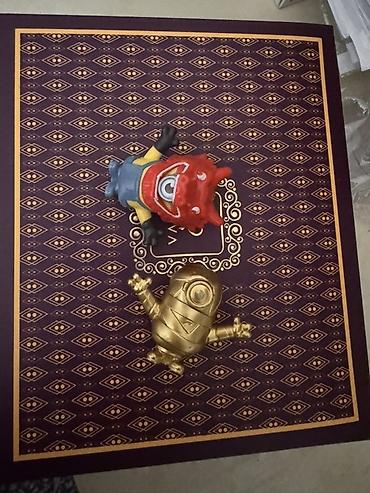 oyuncaq ev: Məhsul: Minions mövzusunda iki ədəd kolleksiya fiquru seti Təsvir: - — 1