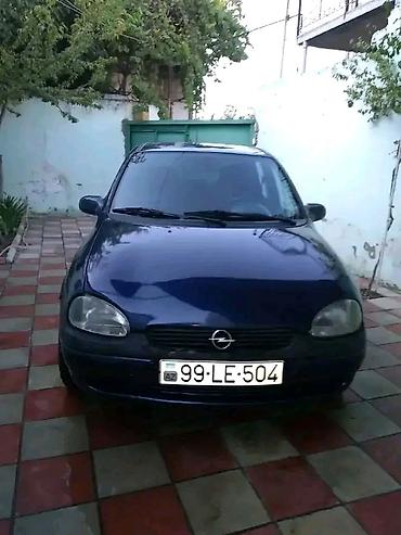 Opel: Opel Corsa B, 5 qapılı hetçbek - Kuzov: tünd mavi rəng, kompakt ölçü — 1