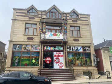 Mağazalar: Binəqədi rayon ərazisində 4 mərtəbəli tam təmirli, 700 kv sahəsi olan — 11