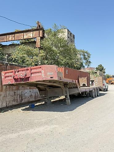 Ağır yüklərin daşınması üçün gücləndirilmiş aşağı platformalı