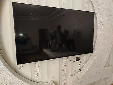 TV və video: 65 inc televizor satılır ekran qırılıb qalan şeyləri işlədi ledleri — 1