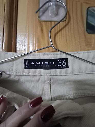 Bej rəng cins şalvar,geyinilmiyib etiketi üzərindədi. S