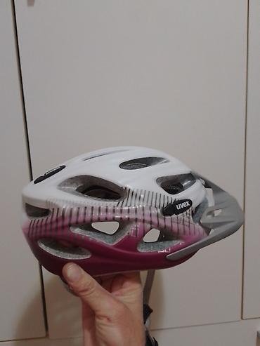 Oprema za bicikliste: Uvex biciklistička kaciga vel obim 52-57 - Brend/model: Uvex (logo na — 4