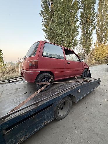 жёсткий сцепка: Daihatsu Cuore: 2001 г., Хэтчбэк — 2