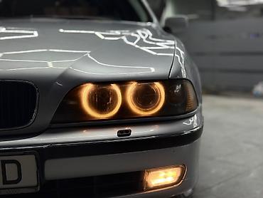 Другие детали салона: BMW — интерьер бизнес-класса с классическим оформлением и богатыми — 17