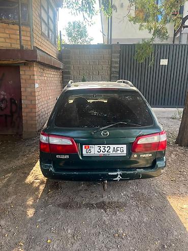 титан диски на ауди 100: Mazda 626: 2001 г., 2 л, Механика, Бензин, Универсал — 6