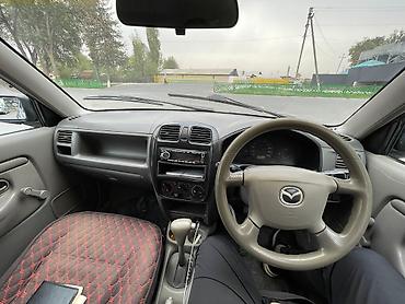 Mazda: Mazda Demio: 2000 г., 1.3 л, Автомат, Бензин, Хэтчбэк — 11