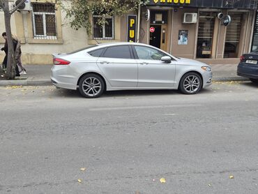 tek oturacaqlar: Ford Fusion: 1.5 l | 2016 il Sedan