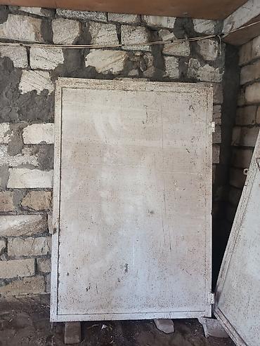 metal: Dəmir qalın qaraj qapısı.Uzunlugu 2.5 m.Hundurluk 1.90 m.Karkas qalın — 7