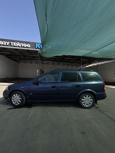 гак 8: Opel Astra: 2001 г., 1.8 л, Механика, Бензин, Седан — 1