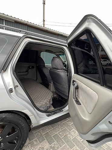 магна: Nissan Primera: 1999 г., 1.8 л, Механика, Бензин, Универсал — 7