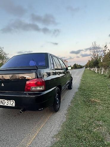 avto mubadiləsi: Model: Saipa Tiba/Saba (sedan), qara rəng Kuzov: 4 qapılı sedan, qara — 2