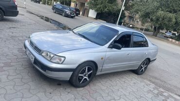 тайота is: Toyota Carina E: 1997 г., 1.8 л, Механика, Бензин, Седан