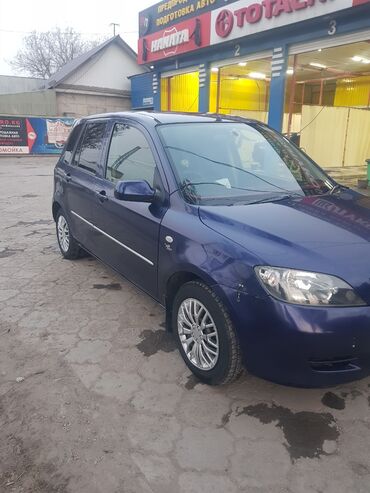 кредит на машину: Mazda Demio: 2003 г., 1.3 л, Автомат, Бензин, Седан