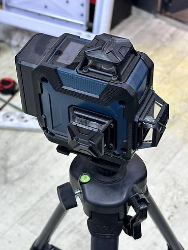 Измерительные инструменты и детекторы: Лазерный нивелир 3D на штативе - Тип: самонивелирующийся лазерный — 2