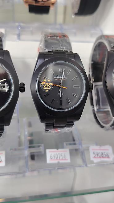 seven friday: Məhsul: Qara rəngli qol saatları (Oyster Perpetual üslubu) Təsvir: - — 2
