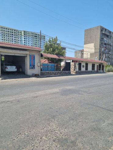 Restoran, kafelər: Yeni Günəşli V massivində yol kənarı,sahəsi 300kv/m olan,(10 sot — 2