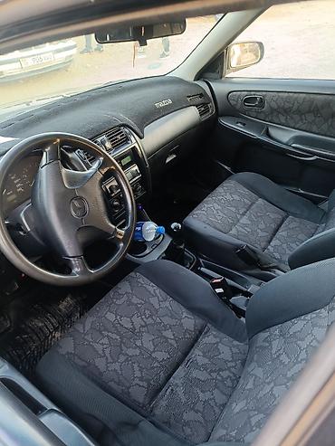 антискотч для авто: Mazda 626: 1998 г., Механика, Бензин, Универсал — 8