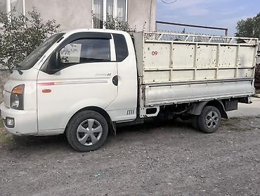 портерге тент: Hyundai Porter II, бортовой малотоннажный грузовик. Основные — 3