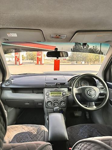 camry 5: Mazda Demio: 2004 г., 1.5 л, Автомат, Бензин, Хэтчбэк — 8