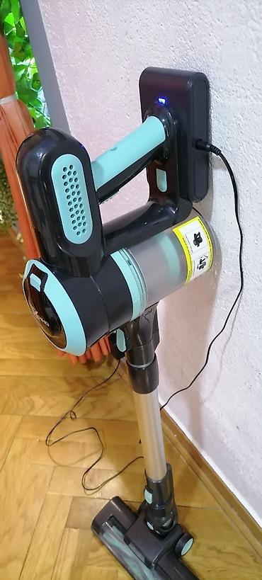 grejaci za stopala: Usisivač ručni na bateriju XIXO sa punjačem. Lepo vuče. Turbo — 2