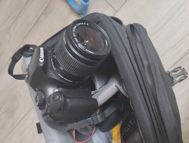 Фотоаппараты: Зеркальный фотоаппарат Canon с комплектным зум-объективом Canon Zoom