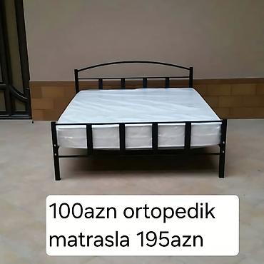 Metall çarpayı – klassik dizaynlı, qara rəngdə möhkəm karkas. - Başlıq