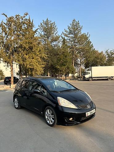 самое бортовой: Honda Fit: 2009 г., 1.5 л, Автомат, Бензин, Хэтчбэк — 1