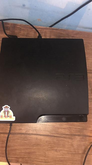 playstation 5 slim aksesuar: PlayStation 3 (PS3) Slim oyun konsolu - Rəng: Qara, mat korpus, üst — 1