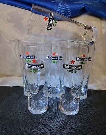 trimer lilly: Case nove,vintaz Heineken za pivo 0,350 L . Case sve na njima odsjaj — 2