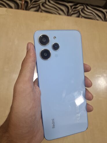 телефон флай фс517: Redmi 12, 128 ГБ, цвет - Голубой, Отпечаток пальца
