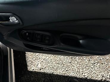 xiaomi su7 max: Nissan Almera: 2004 г., 1.8 л, Автомат, Бензин, Хэтчбэк — 9