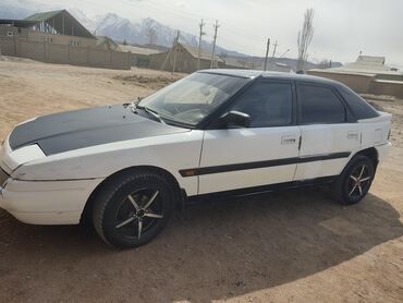 рассрочкага машине алам: Mazda 323: 1990 г., 1.6 л, Механика, Бензин, Хэтчбэк