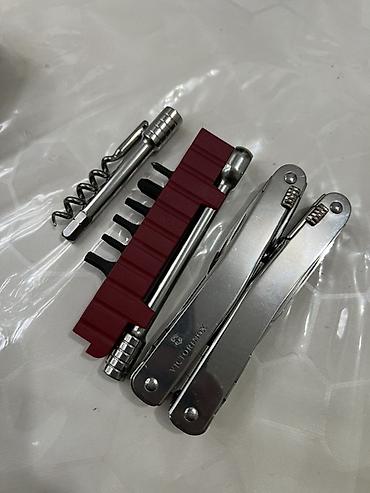 Инструменттер: Мультитул Victorinox (серия SwissTool/Spirit) с кожаным чехлом и — 2